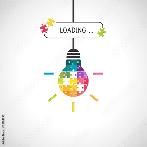 Loading idea concept with light bulb made of colorful puzzle pieces