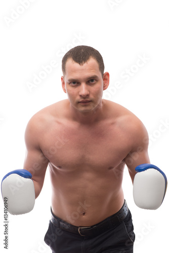 athlete with boxing gloves on a white background in studio