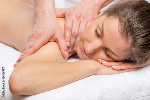 young beautiful girl during the massage relaxed