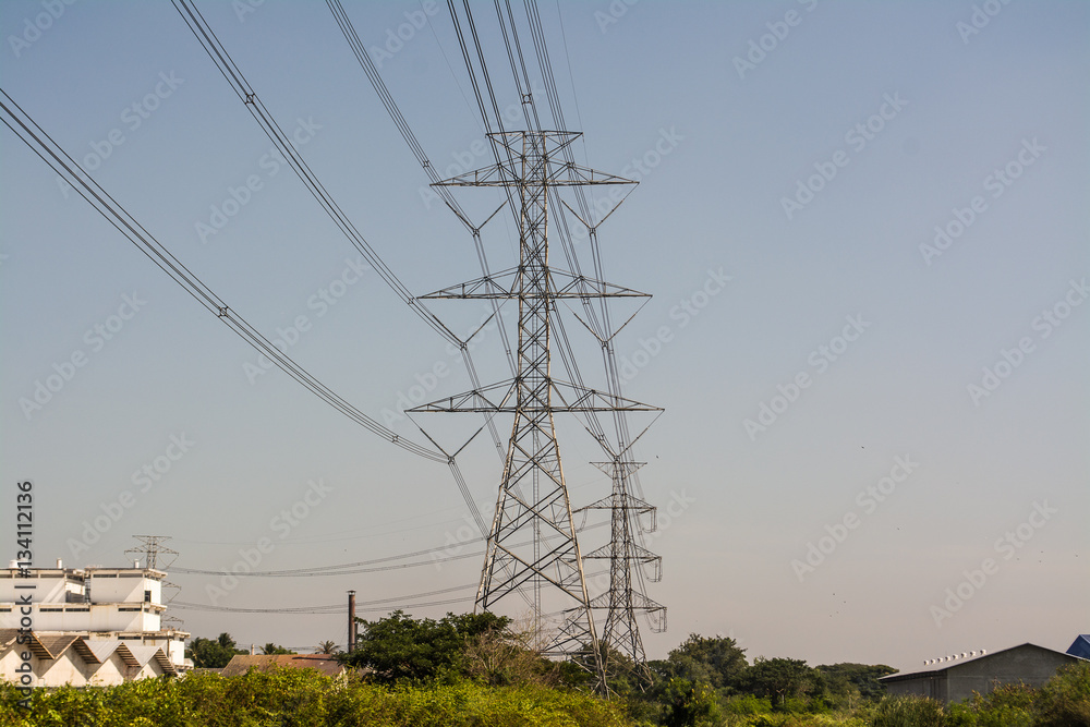 Obraz premium High voltage power line and pole