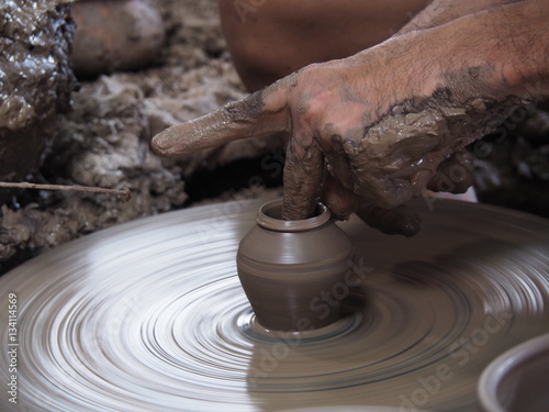 Close up of hands doing the pottery, Selective focus at pottery. photo