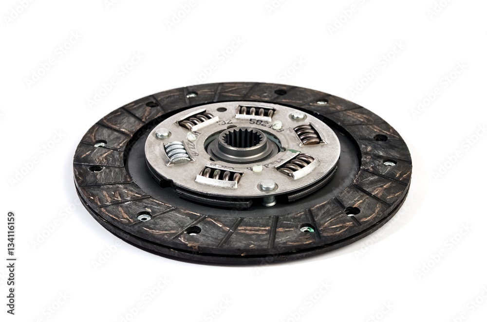 The new clutch disc under the white background The new clutch disc under the white background