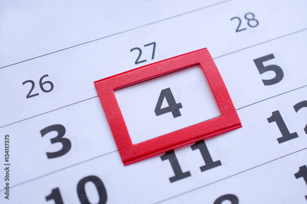 White paper calendar with the number 4 in the red box White paper calendar with the number 4 in the red box
