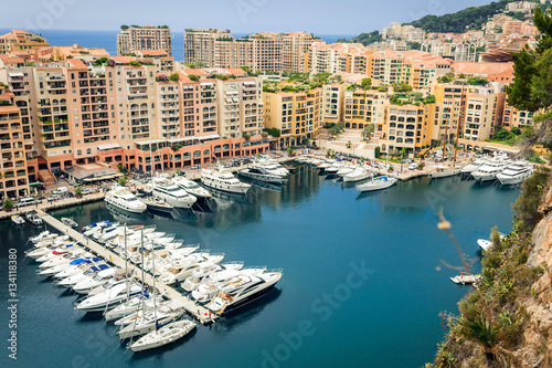 Monte Carlo harbour city panorama. View of luxury yachts and apartments in harbor of Monaco