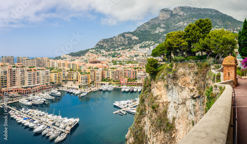 Fototapeta Naklejka Na Ścianę i Meble -  Monte Carlo harbour city panorama. View of luxury yachts and apartments in harbor of Monaco