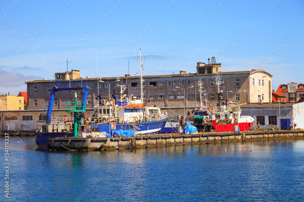 Fishing ships on the quay in port of Hel, Poland.