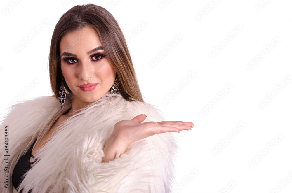 Beautiful young girl holding an empty hand outstretched. Beautiful young girl holding an empty hand outstretched.