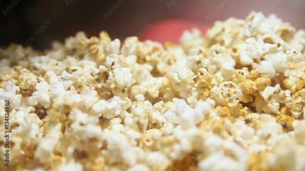 A pile of roasted popcorn machine popcorn A pile of roasted popcorn machine popcorn