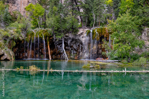 waterfalls and fallen timber logs at Hanging Lake U.S. National Natural Landmark in Glenwood Canyon White River National Forest, Garfield county, Glenwood Springs, Colorado, USA