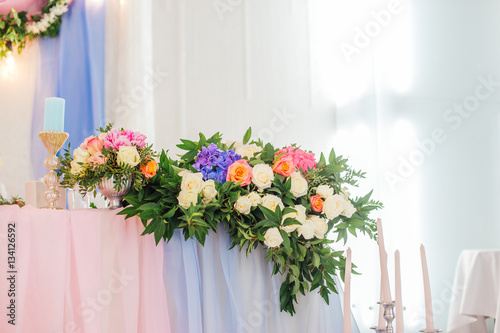 Wedding decor  table setting  floral arrangements in the restaurant