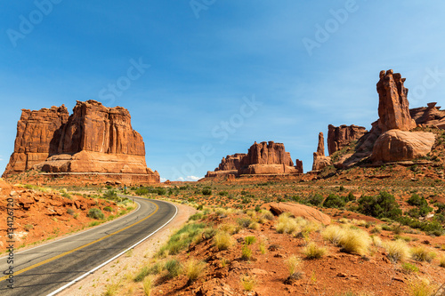 Road and rocky mountains in the distance landscape