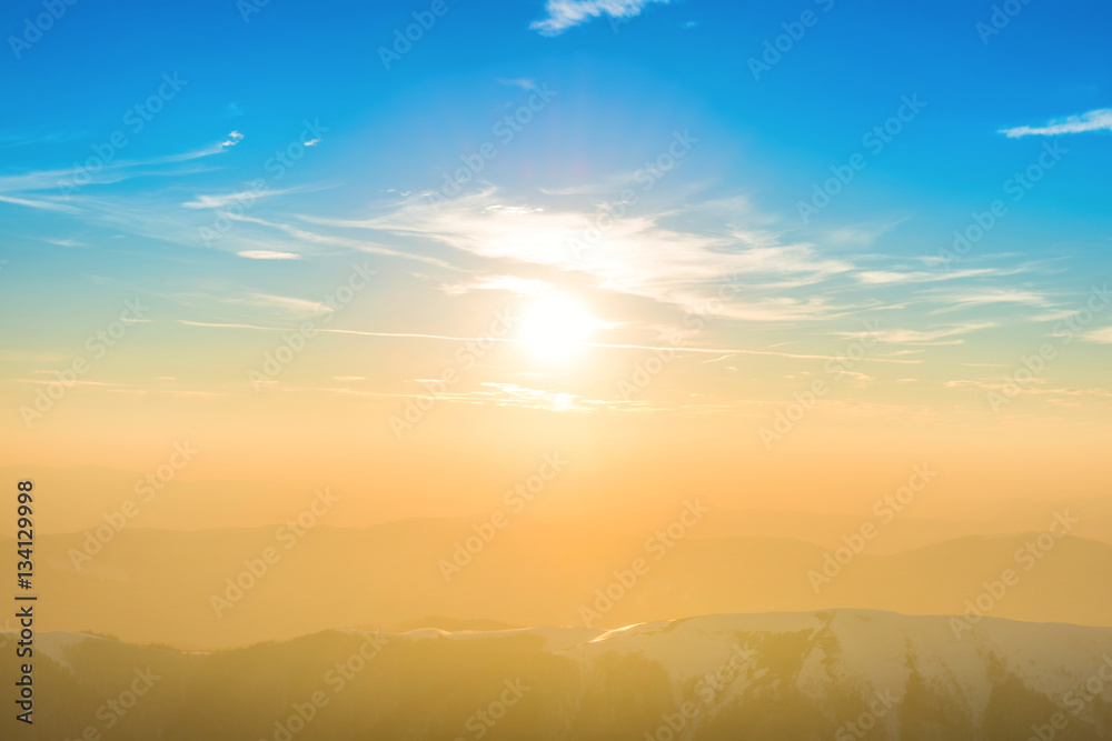 Sunset over hills and mountains