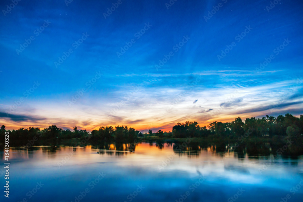 Beautiful colorful sunset on a lake