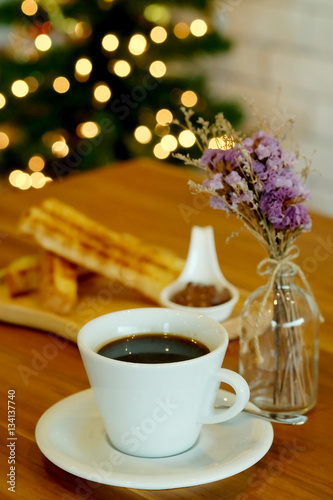 black coffee with Homemade French Toast Sticks and hazelnut spread with bokeh background