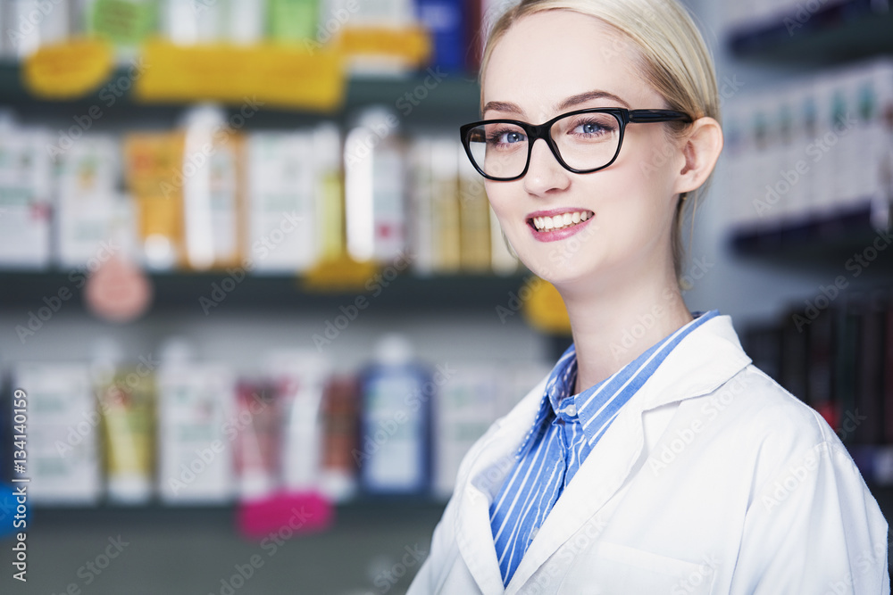 close up portrait of young woman pharmacist smiling