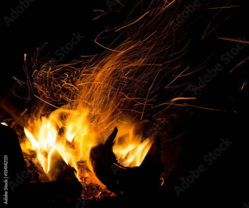 fire with sparks on a black background