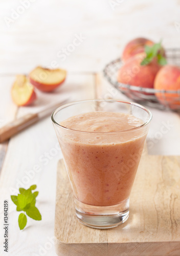 peach smoothie in glass
