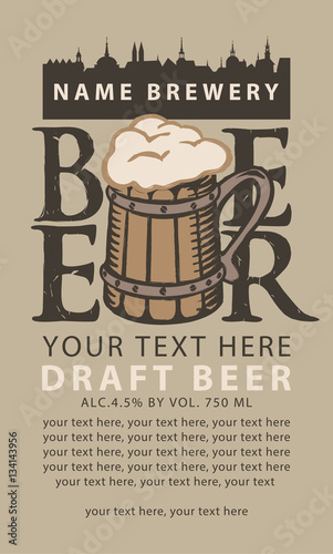label beer with the old town and wooden glass