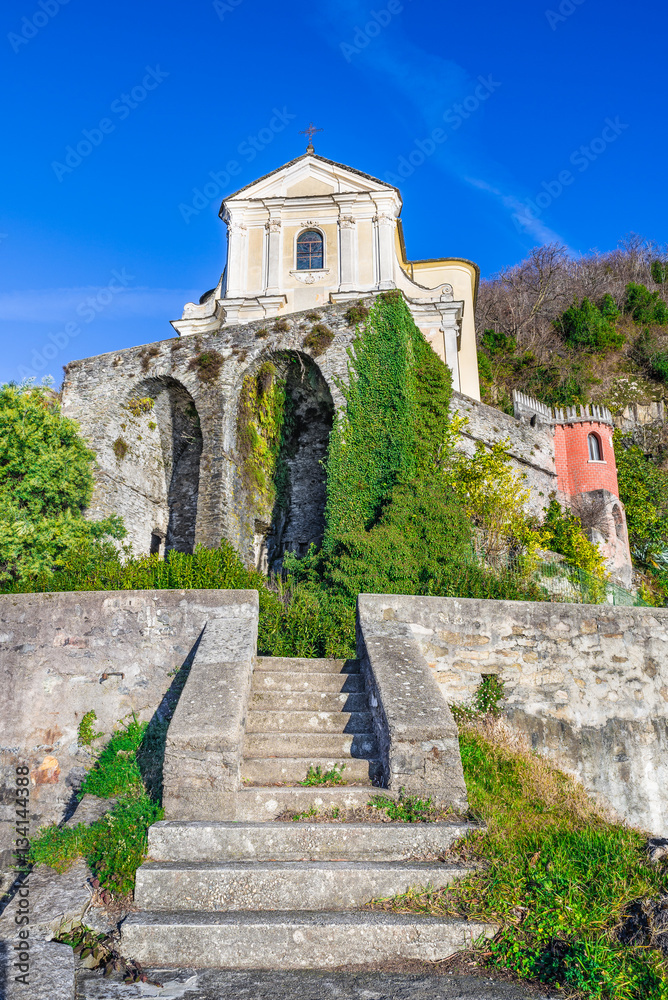 Fototapeta premium Sanctuary Madonna della Punta on Lake Maggiore, Maccagno, province of Varese, Italy. The church, also called Madonna del Rosario, is counted among the 72 Marian shrines of the Diocese of Milan