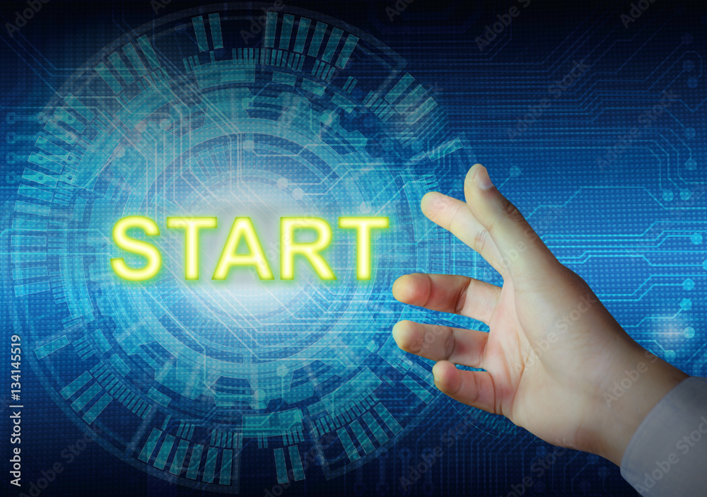 Businessman touching start button