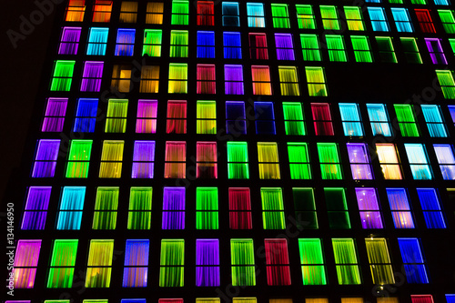 Colored windows texture. Neon light background