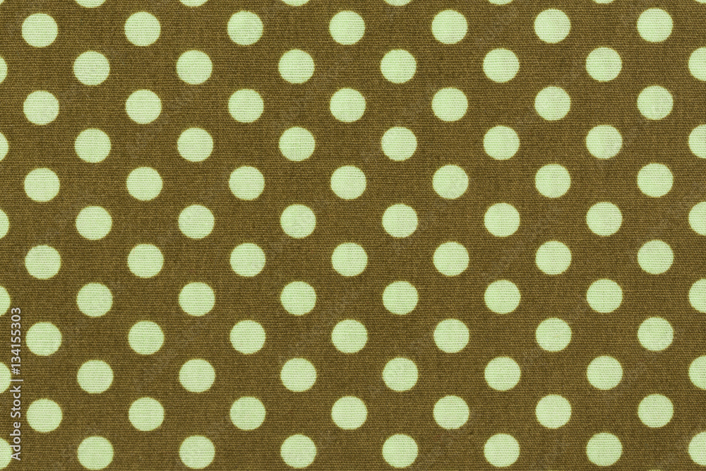Beige with light green polka dots background pattern.
