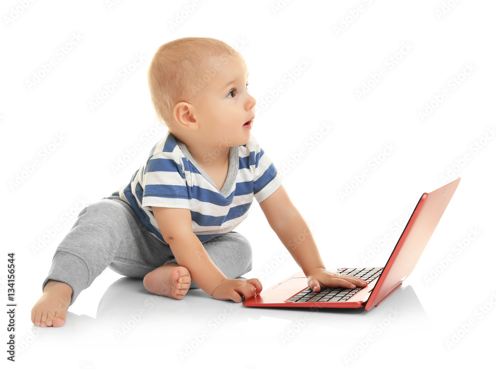 Cute baby boy with laptop on white background Cute baby boy with laptop on white background