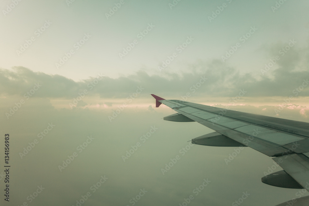 View from plane window, cloud sky View from plane window, cloud sky