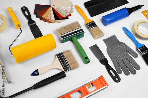 Fotografija Set of professional decorator equipment on white background