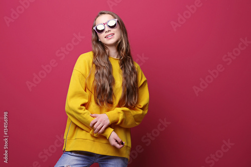 Pretty teenager girl on col...