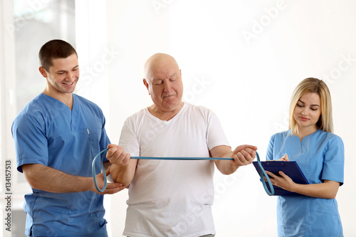 Physiotherapist working wit...