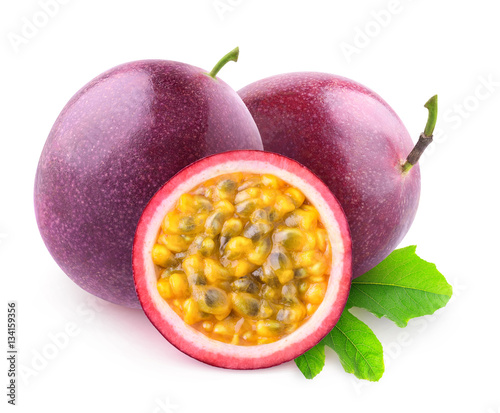 Isolated maracuya. Two whole passion fruits and a half isolated on white background with clipping path