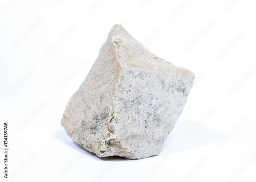 Single natural stone on white background Single natural stone on white background