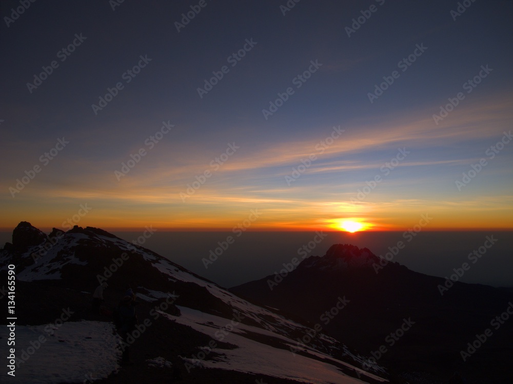 Sunrise from stella point high on Mt Kilimanjaro Sunrise from stella point high on Mt Kilimanjaro