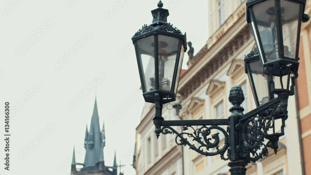 View on the buildings and street lantern on the old square in Prague View on the buildings and street lantern on the old square in Prague