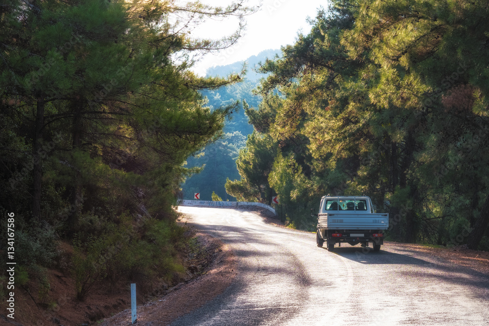 Fototapeta premium Pickup Truck on the Mountain Road