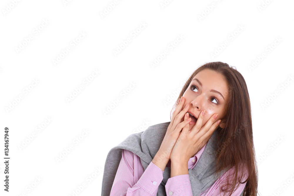 Young woman standing on the white background Young woman standing on the white background