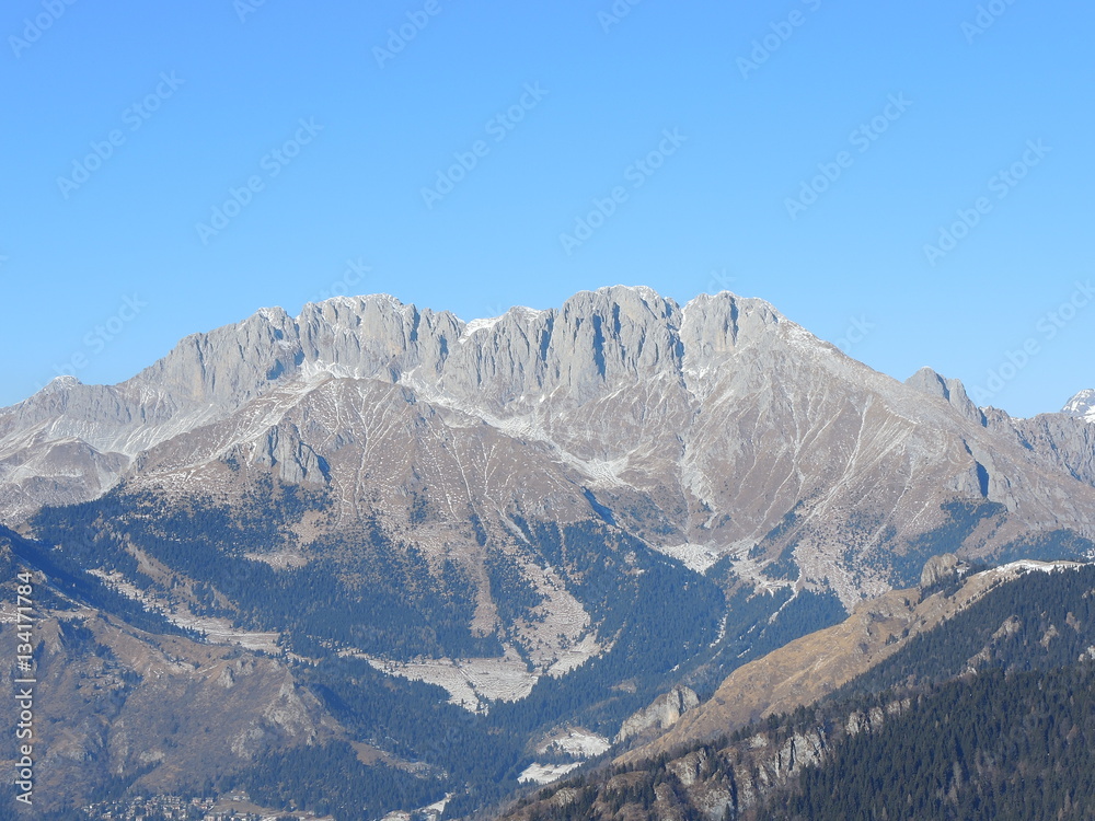 Wonderful panorama from Monte Pora to Presolana in winter dry season. Orobie Prealps, Bergamo, Lombardy, Italy.