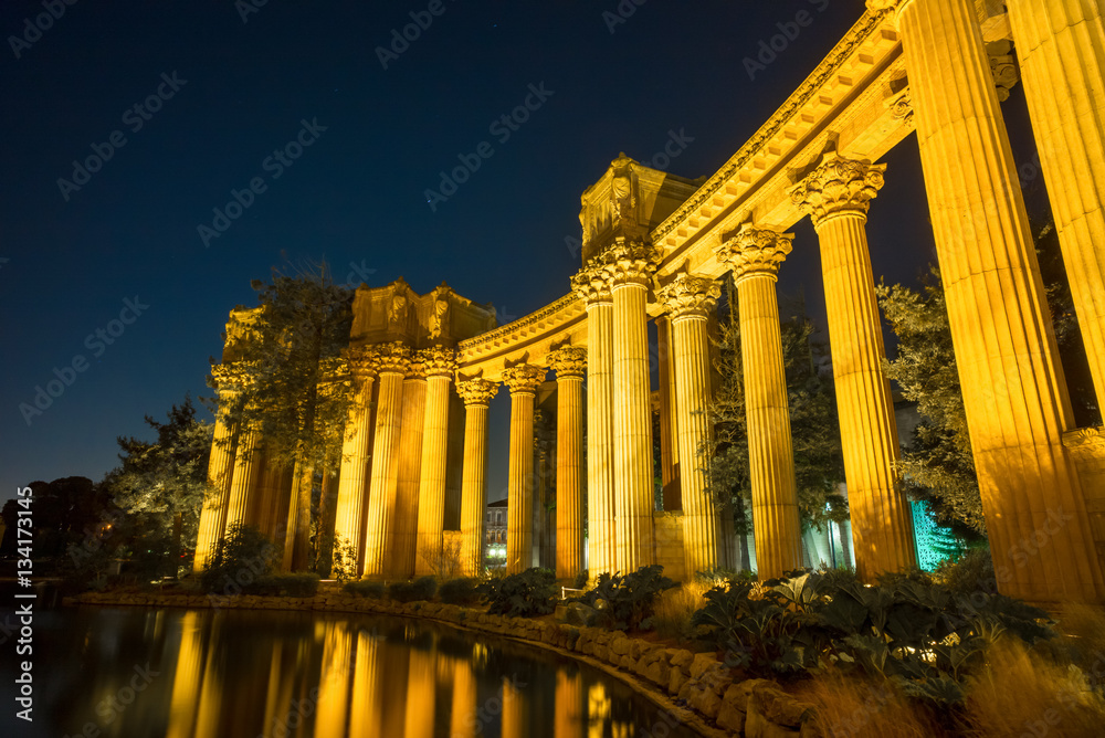 Colonnade pillars at the Palace of Fine Arts Museum at Night in San Francisco, California, USA