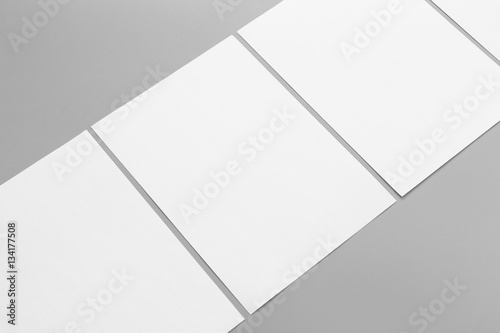 Blank portrait A4. brochure magazine isolated on gray, changeable background / white paper isolated on gray
