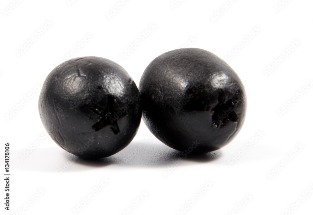 Black olives isolated on a white background Black olives isolated on a white background
