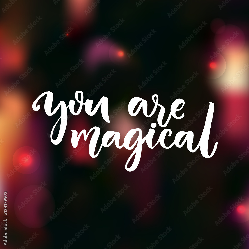 You are magical. Love confession saying. Valentine's day card. Vector modern calligraphy at dark red blurred background