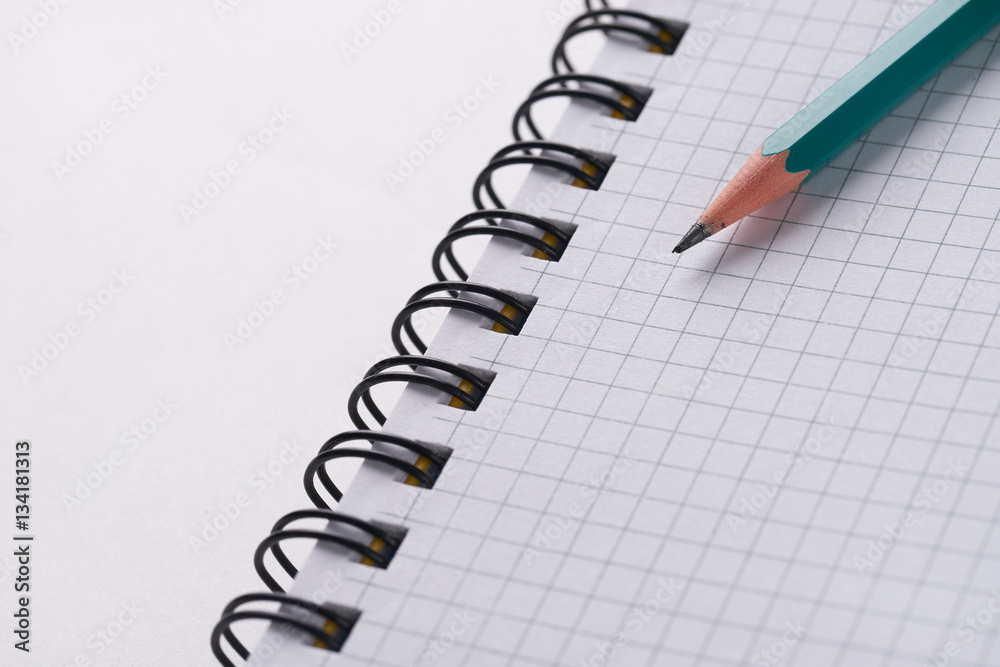 Image of pencil and notebook. Close up shot Image of pencil and notebook. Close up shot