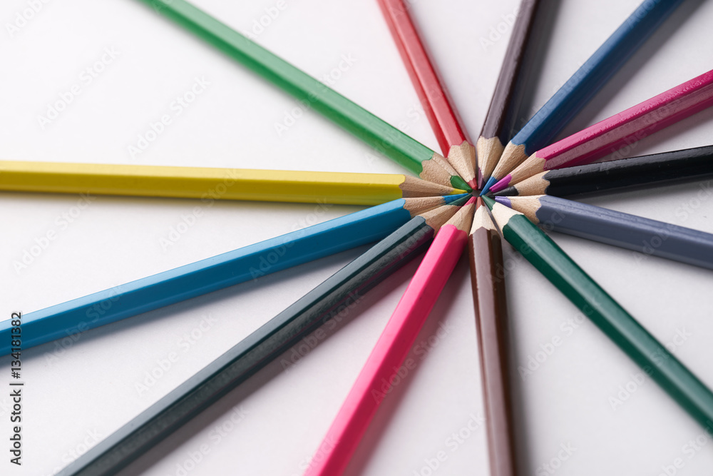 Circle of colorful pencils on white background. Close up shot Circle of colorful pencils on white background. Close up shot