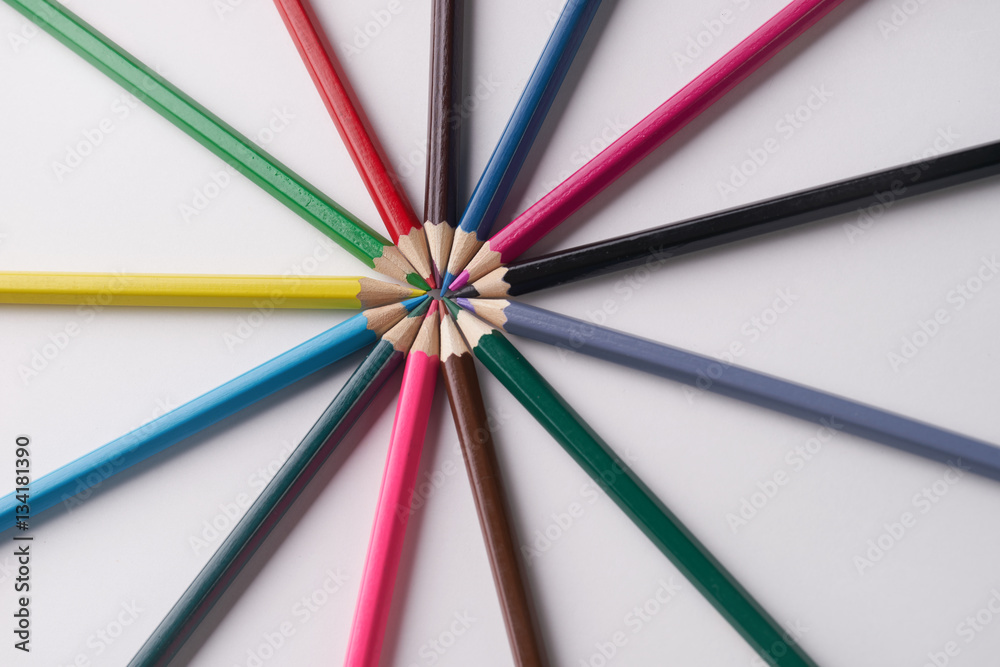 Circle of colorful pencils on white background. Close up shot Circle of colorful pencils on white background. Close up shot