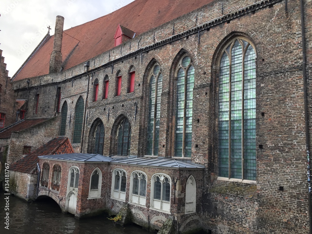 Brugge house history building near canals view in Belgium