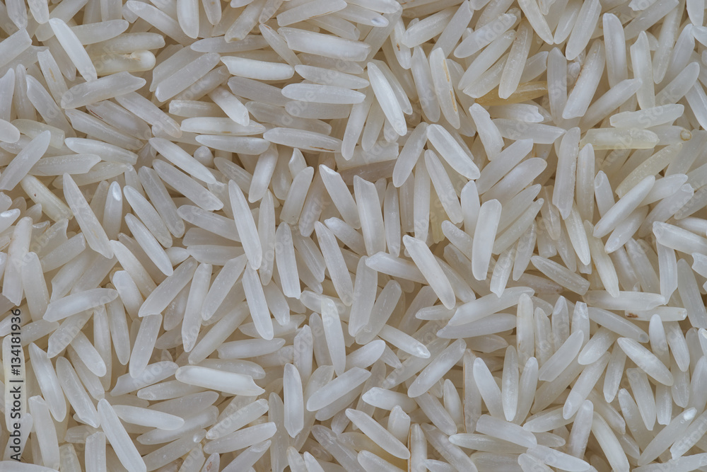 Цhite Rice long grain texture background. Indian basmati rise Цhite Rice long grain texture background. Indian basmati rise