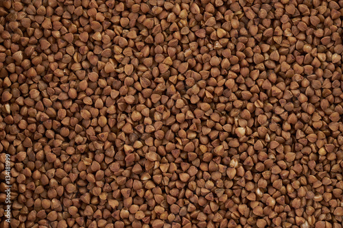 buckwheat grains closeup top view background. Healthy food