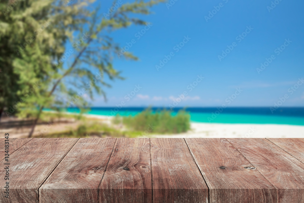Fototapeta premium Empty wooden table top on the beach.