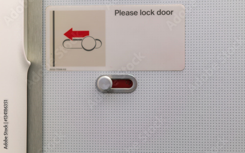 Obraz na plátne Airplane lavatory lock door .